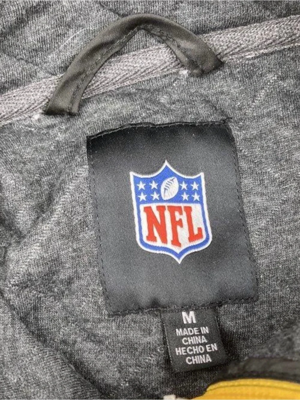 NFL Black and Gray Quilted Pullover with Yellow Zip